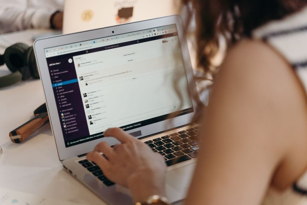 Sleep consultant business owner reviewing an email nurture sequence on a laptop