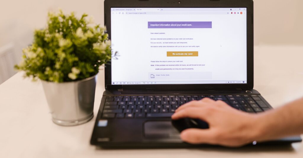 Reading an email on a laptop, representing a GetResponse review of its email-first platform — featured image for thesmartfunnel.com
